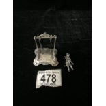 DUTCH HALLMARKED SILVER MODEL OF A GIRL ON A SWING WITH EMBOSSED RECTANGULAR BASE, IMPORT MARKS