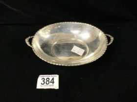 EDWARDIAN HALLMARKED SILVER OVAL TWO HANDLED DISH WITH HUSK DECORATED BORDER ON PIERCED FEET.