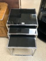 MODERN CHROME AND BLACK TEMPERED GLASS NEST OF THREE TABLES