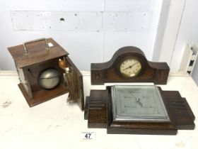 EDWARDIAN WALNUT CASED BATTERY POWERED TRAVELLING SERVANTS BELL, AN OAK MANTEL CLOCK AND A OAK