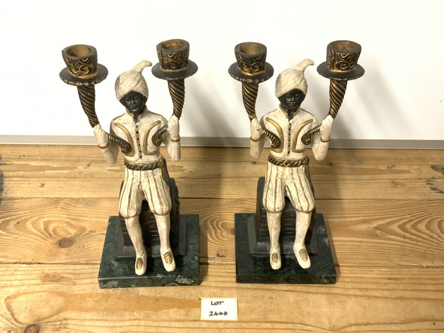 TWO BRONZE SEATED BLACKAMOORS ON MARBLE BASES 27CM