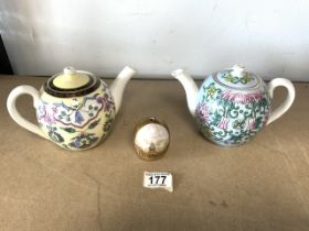 TWO USSR PORCELAIN GLOBULAR TEAPOTS WITH STYLISED FLORAL DECORATION FROM THE PERVOMAYSKY PORCELAIN