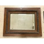 ORNATELY CARVED WOODEN FRAMED WALL MIRROR 90 X 70CM