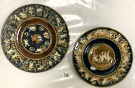 TWO 19TH-CENTURY MAJOLICA GLAZED WALL PLATES DECORATED WITH PUTTI, THE LARGEST 36CM (ONE RESTORED)