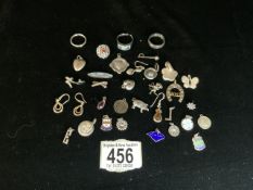 MIXED SILVER JEWELLERY INCLUDES RINGS, CHARMS, PENDANTS AND MORE