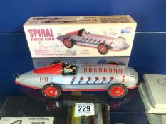 BOXED SPIRAL WIND UP RACE CAR BY SCHYLLING 33CM