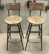 TWO INDUSTRIAL METAL BASE SWIVEL STOOLS