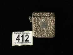 A VICTORIAN STERLING SILVER VESTA CASE; BIRMINGHAM 1898, EMBOSSED WITH SCROLL DECORATION;