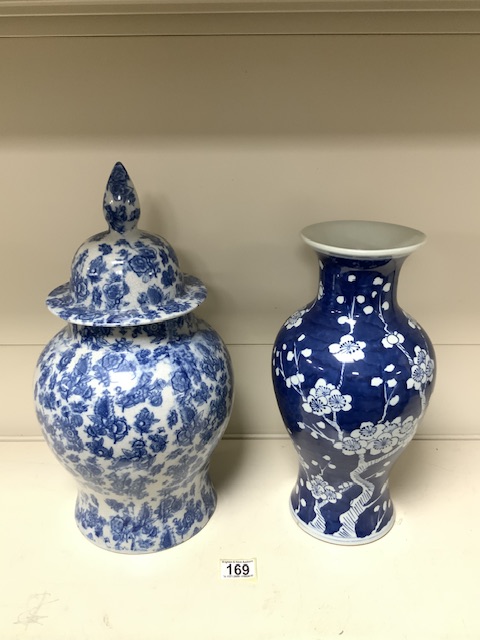 TWO CHINESE BLUE AND WHITE VASES ONE DECORATED WITH A BLOSSOM DECORATION LARGEST; 46CM