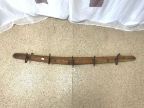 ANTIQUE WOOD AND METAL COAT HOOKS; 127CM