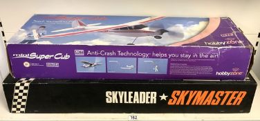TWO BOXED LARGE MODEL AIRCRAFTS, THE SKY LEADER SKYMASTER AND MINI SUPER CUB BY HOBBY ZONE