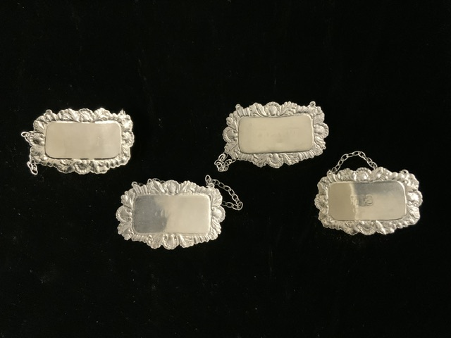 A SET OF FOUR STERLING SILVER WINE / SPIRIT LABELS; LONDON 1973-1975; RECTANGULAR FORM WITH SHELL; - Image 4 of 4