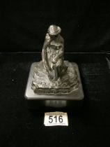 A 19TH CENTURY CONTINENTAL BRONZE FIGURE ON A BLACK BASE, DEPICTING A KNEELING FEMALE FIGURE, IN