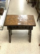 EARLY ANTIQUE WOODEN STOOL WITH CARVED PORTRAITS TO THE UNDERNEATH; 51 X 55CM