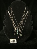 SIX SILVER NECKLACES AND PENDANTS; STAMPED 925; VARIOUS SHAPES INCLUDING A GIRAFFE; TOTAL WEIGHT