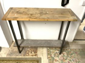 TWO TIER METAL FRAMED TABLE; 122 X 43 X 103CM