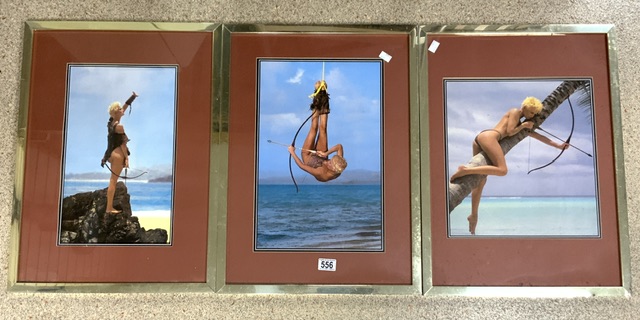 THREE FRAMED AND GLAZED PHOTOGRAPHS OF A LADY WITH A BOW AND ARROW; 45 X 60CM