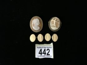 TWO VINTAGE OVAL CAMEO BROOCHES, ONE DEPICTING A FEMALE FACE IN PROFILE, THE OTHER A DANCING