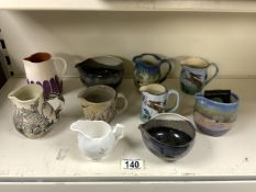 MIXED ART POTTERY JUGS INCLUDES RUPERT BLAMIRE, SARK AND MORE