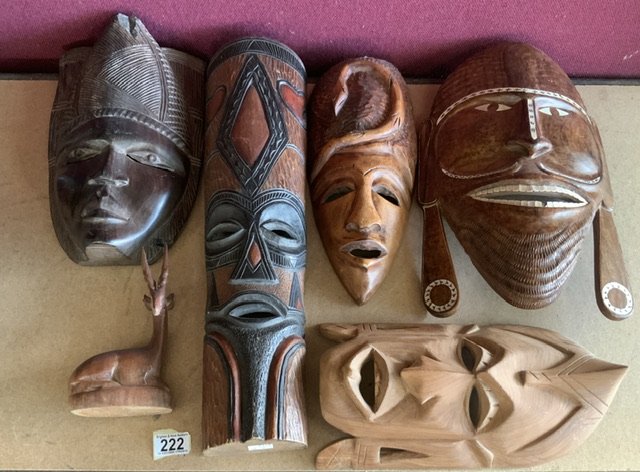 FIVE AFRICAN WOODEN MASKS INCLUDES MOTHER OF PEARL INLAY