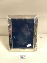 HALLMARKED SILVER RECTANGULAR PHOTO FRAME DATED 1986 BY CARR'S OF SHEFFIELD LTD. APERTURE 18 X