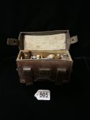 A WWI GERMAN MEDICAL ORDERLY'S POUCH WITH VARIOUS CONTENTS; THE LEATHER CASE MARKED ' BACH &