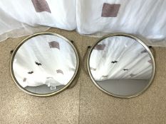 PAIR OF SILVER FRAMED ROUND WALL MIRRORS; 58CM