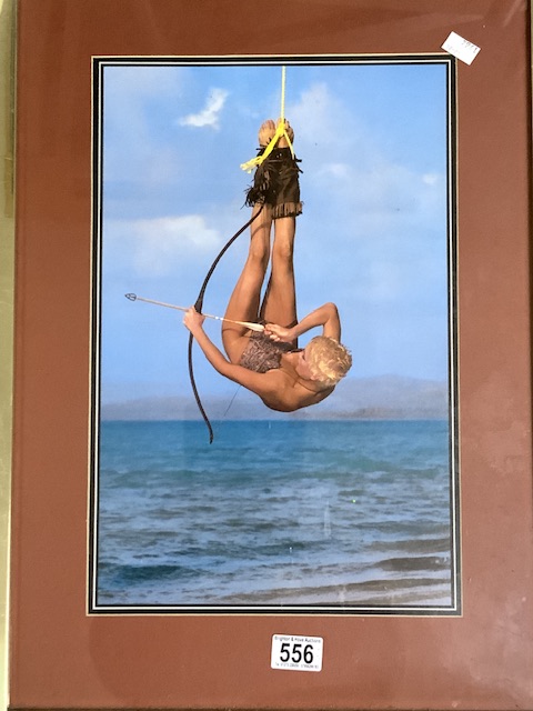 THREE FRAMED AND GLAZED PHOTOGRAPHS OF A LADY WITH A BOW AND ARROW; 45 X 60CM - Image 3 of 5