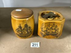 TWO VINTAGE CERAMIC TOBACCO JARS BY DUNHILL; LARGEST 13CM