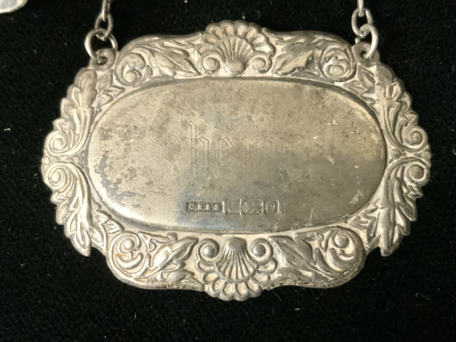 A STERLING SILVER SPIRIT LABEL; BIRMINGHAM 1988; EMBOSSED FOLIATE AND SHELL BORDER; ENGRAVED ' - Image 2 of 4