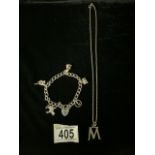 A SILVER CHARM BRACELET & A SILVER INITIAL M PENDANT ON CHAIN; BRACELET WITH VARIOUS CHARMS