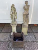 TWO CONCRETE FIGURES ON PLINTHS; LARGEST 125CM; WITH A CAST IRON PLANTER A/F