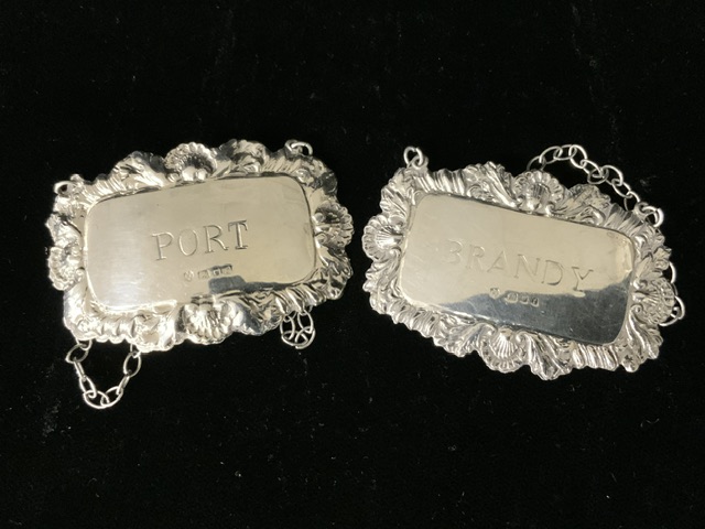 A SET OF FOUR STERLING SILVER WINE / SPIRIT LABELS; LONDON 1973-1975; RECTANGULAR FORM WITH SHELL; - Image 2 of 4