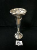AN EDWARDIAN STERLING SILVER BUD VASE BY T.E ATKINS; BIRMINGHAM 1910; FLAT FLUTED FORM ON A CIRCULAR