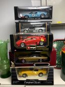 THREE BURAGO DIE CAST BOXED CARS, TWO MAITSO AND ERTL AND MORE ALL 1;18 SCALE