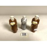 THREE ROYAL WORCESTER CANDLE SNUFFERS IN THE FORM OF MONKS LARGEST; 33CM