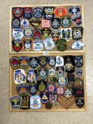 LARGE QUANTITY OF POLICE AND FIRE SERVICES CLOTH BADGES
