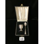 A CASED STERLING SILVER EGG CUP AND SPOON; THE EGG CUP; BIRMINGHAM 1976, THE OLD ENGLISH PATTERN