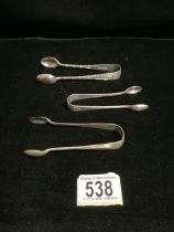 A PAIR OF STERLING SILVER RATTAIL PATTERN SUGAR TONGS, SHEFFIELD 1931, ANOTHER PAIR OF STERLING