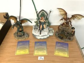 THREE SPELLBOUND MYTHILOGICAL FIGURE AND DRAGONS