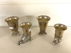 FOUR CHALICE HUNTING CUPS SILVER-PLATED WITH FINELY WORKED ANIMAL HEADS