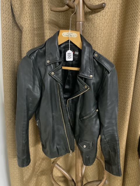 BLACK LEATHER JACKET BY JONATHAN A LOGAN. SIZE 8 - 10. DAMGE TO SLEEVE LINING A/F.