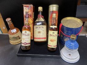 FIVE BOTTLES OF BELLS WHISKY; 1.5 LITRES; 70CL, 75 CL, 75 CL AND A 1990 ROYAL DECANTER QUEEN'S