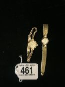 A 9 CARAT GOLD LADIES TISSOT WRISTWATCH, CHAIN STRAP, BIRMINGHAM AND A HERMES LADIES WRISTWATCH