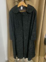 BLACK ASTRAKHAN FULL LENGTH COAT - APPROX SIZE 16. GOOD CONDITION.