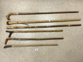 SIX WOODEN WALKING STICKS