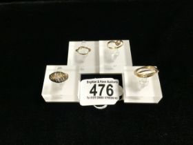 FOUR 9 CARAT GOLD RINGS; ONE LONDON 1987, OPENWORK SWIRL DECORATION, ONE LONDON 1977, MOUNTED WITH A