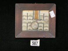 A FRAMED WWI BRITISH WAR MEDAL, MOUNTED INFRONT OF A POSTCARD 'THE ALLIED WARSHIPS BOMBARDING THE