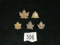 FIVE CANADIAN BATTALION METAL CAP BADGES