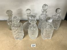 SEVEN CUTGLASS DECANTERS; ONE BEING SHIPS AND ONE BEING ROYAL BRIERLEY GLASS